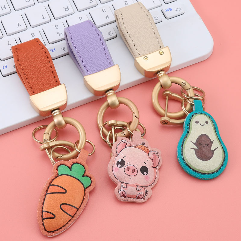 Nuevo llavero de piel de cordero francés pequeño llavero fresco colgante mini bolso corto colgante pequeño joyería