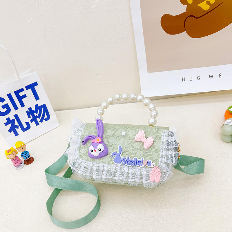 Bolso de los niños al por mayor bolsa de mensajero de las niñas bolso de perlas de moda de dibujos animados accesorios bolsa estrella Delu mochila