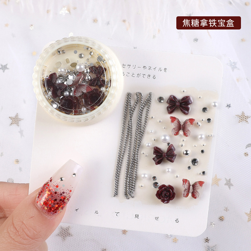 2023 nuevos accesorios de manicura camellia material paquete cadena de mariposa rosa arco mezcla combinación