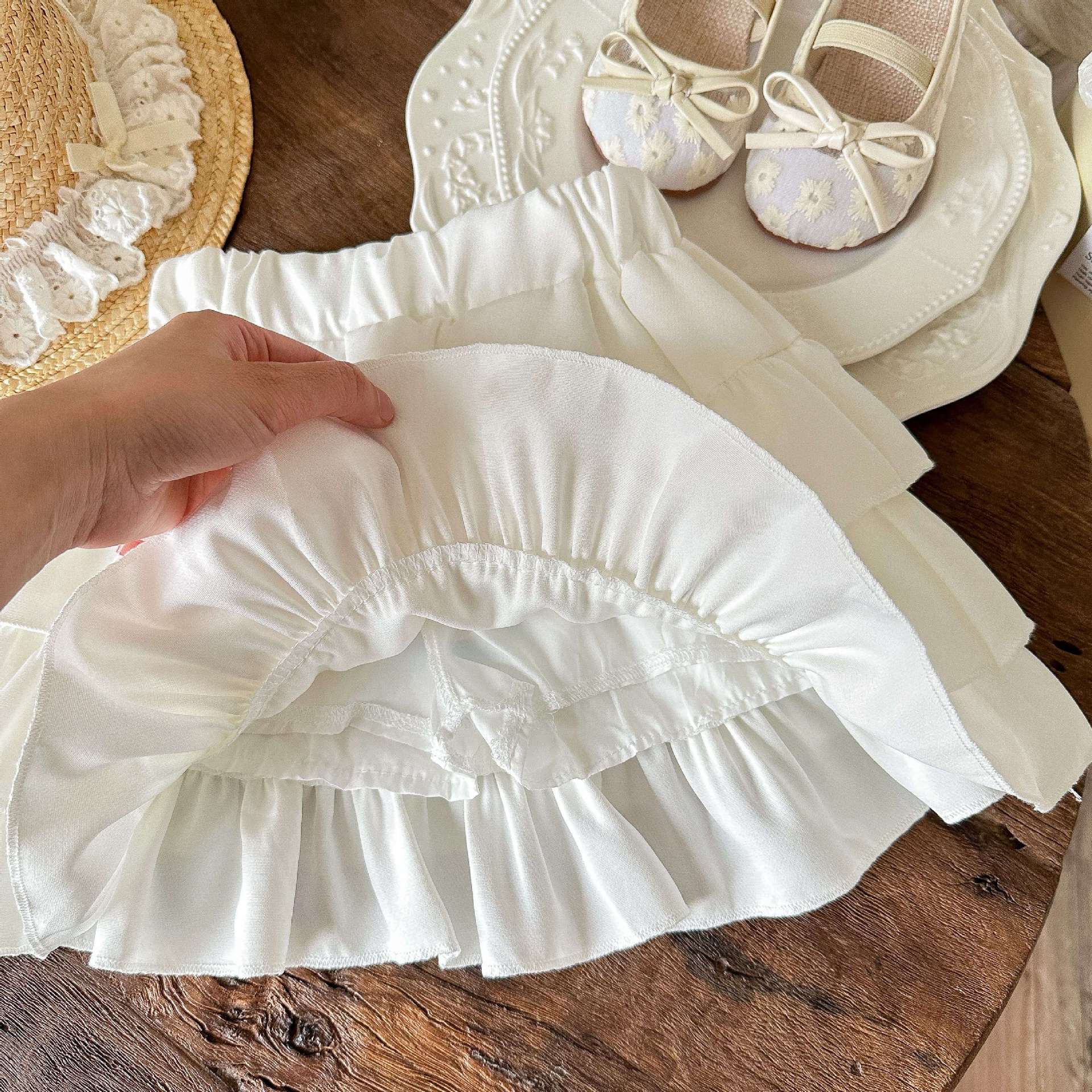 Falda de pastel de niña de artefacto de todo fósforo, pantalones de todo fósforo de estilo occidental de verano, pantalones de falda de color sólido de verano, bebé femenino