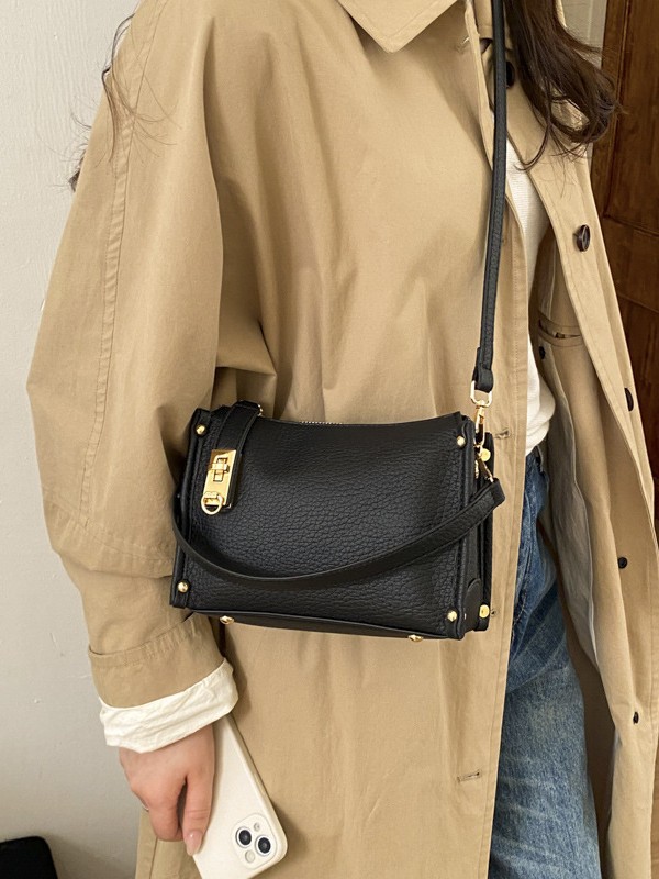 Nicho Zhong textura bolso de mujer 2026 nuevo remaches de gran capacidad simple de hombro simple bolso de brazo de viaje