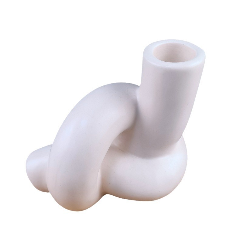 Simple y moderno tubo de torsión geométrica cerámica decoración candelabrera de viento silencioso candelabrera en blanco y negro decoración de la sala de estar