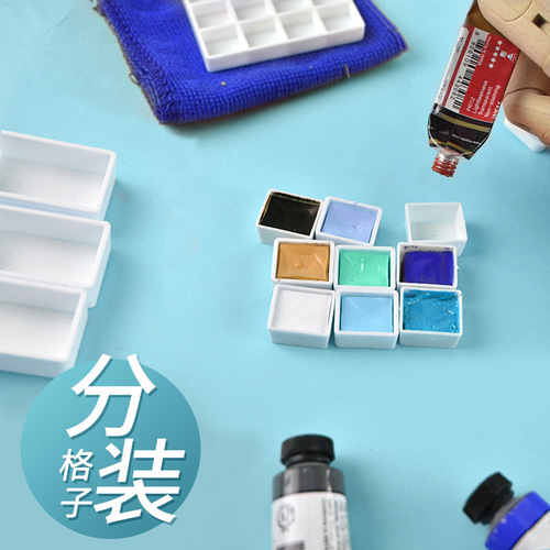 Watercolor paint is packed in small grids, solid paint grids are packed in empty half blocks and full blocks, optional mini empty box solids
