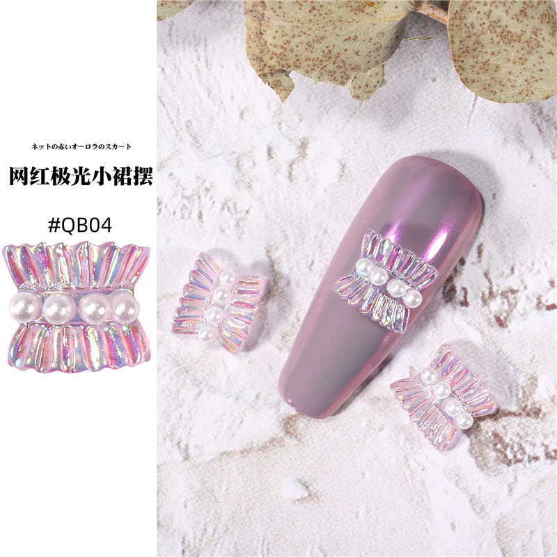 Accesorios de falda de arte de uñas 2021 nueva celebridad de Internet pequeño libro rojo estilo caliente hada aurora falda plisada decoración de uñas