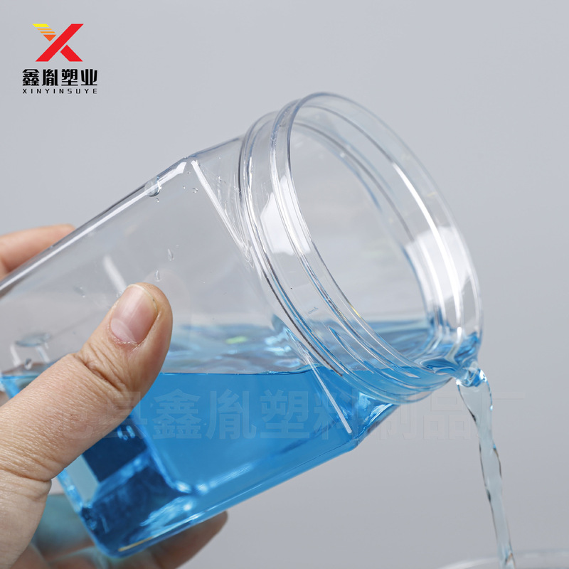 正方形のプラスチック缶 600 ミリリットルアルミ蓋ビスケット包装瓶ペットハンドル付きキャンディボトル 600 グラムナッツプラスチック缶|undefined