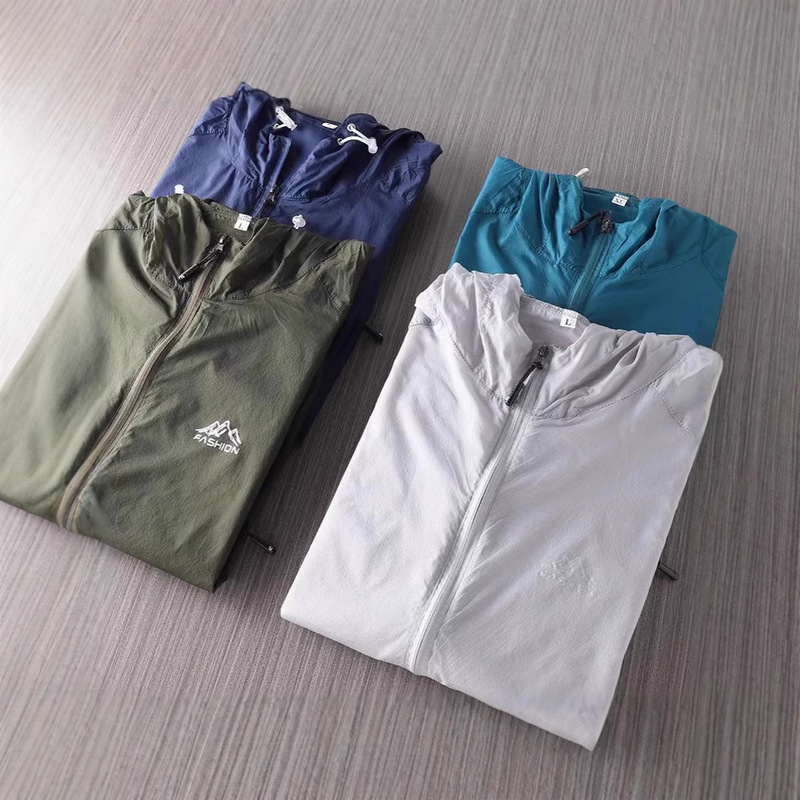 Foreign trade tail single pick-up thin as cicada wings summer men's breathable solid color sunscreen hooded skin jacket jacket jacket