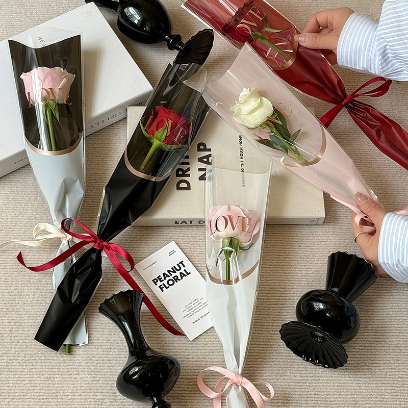 Nueva bolsa de ramo de vacaciones LOVE bronceado bolsa individual bolsa de rosas bolsa de celofán transparente bolsa de flores al por mayor