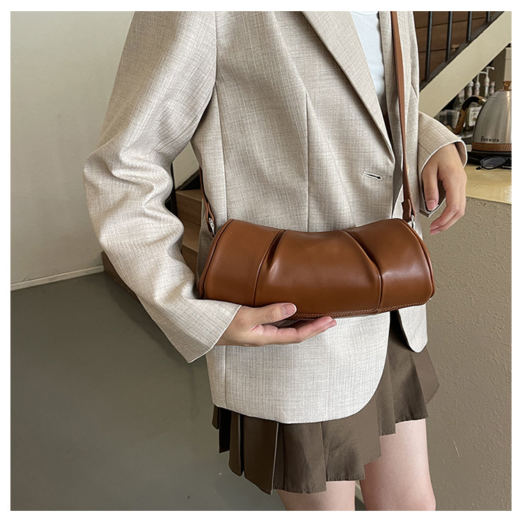 Korean version simple cylindrical women's 2024 new niche pillow versatile casual shoulder crossbody bag_voghion.com