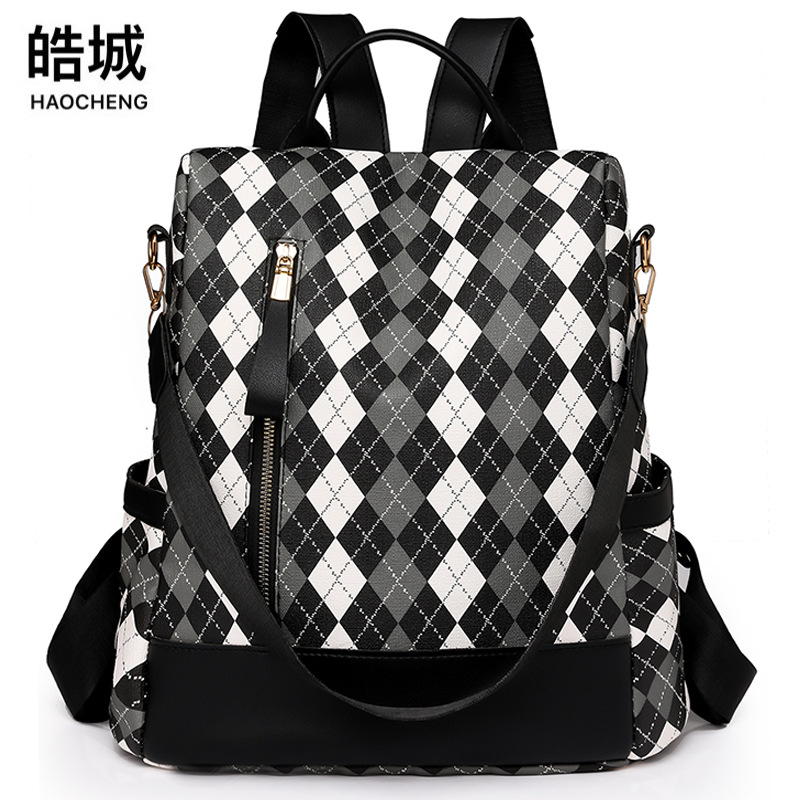 2023 nueva mochila antirrobo de cuero suave para mujer de color en contraste, mochila de viaje ligera al aire libre de gran capacidad a cuadros de moda