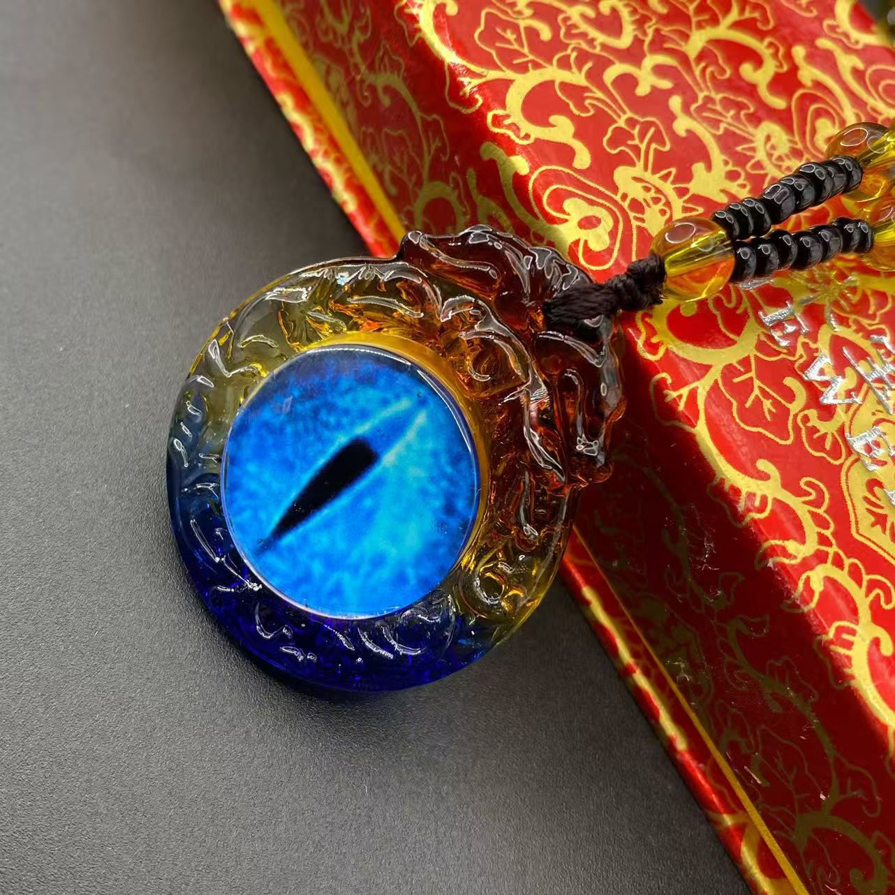 Double-sided glass pendant with blue eyes, tricolor Tibetan ornament, celestial eye sweater chain, hot-selling gift, wholesale from manufacturer.
