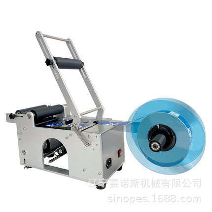 东北全自动不干胶塑料软管玻璃半自动圆瓶贴标机手动贴标机贴机上