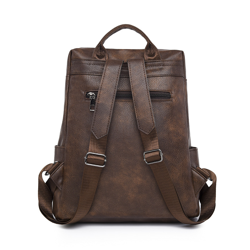 Venta directa de fábrica primavera nueva mochila de cuero suave para mujer de color sólido moda retro de gran capacidad mochila de viaje al aire libre