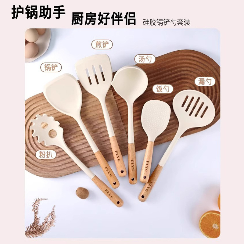 Cuchara de cocina nueva olla antiadherente de grado alimenticio silicona doméstica al por mayor conjunto de cocina resistente a altas temperaturas