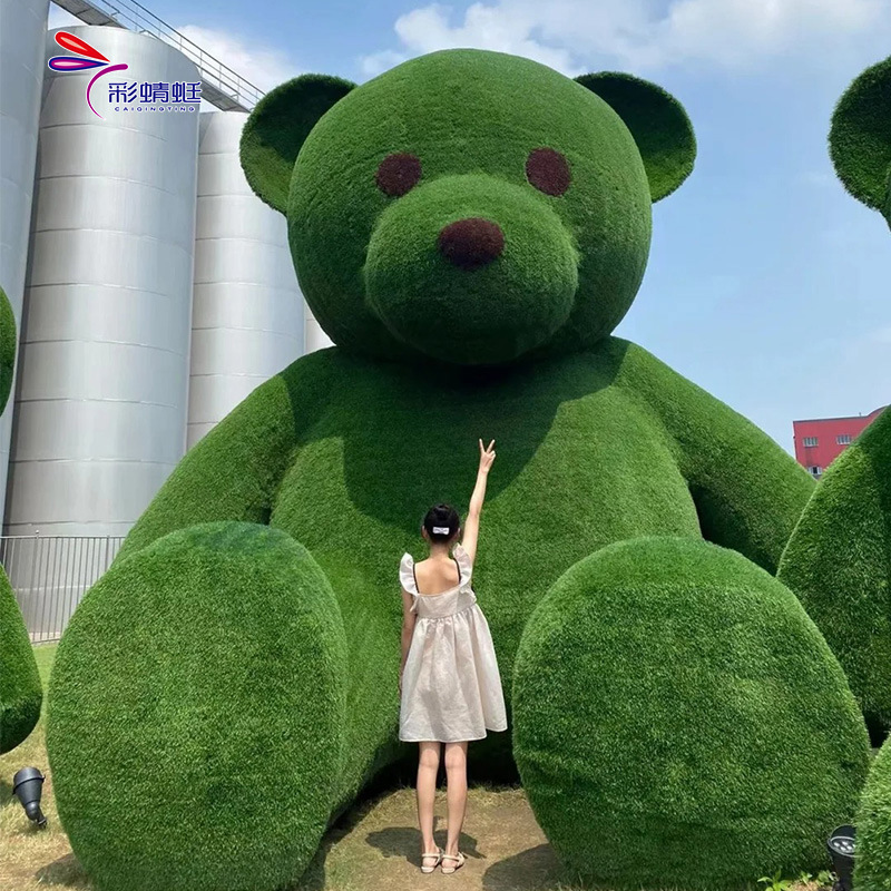 Fábrica de fotos de escultura verde transfronteriza a gran escala para hacer adornos de escultura verde luminosa en la intersección de la calle del parque al aire libre