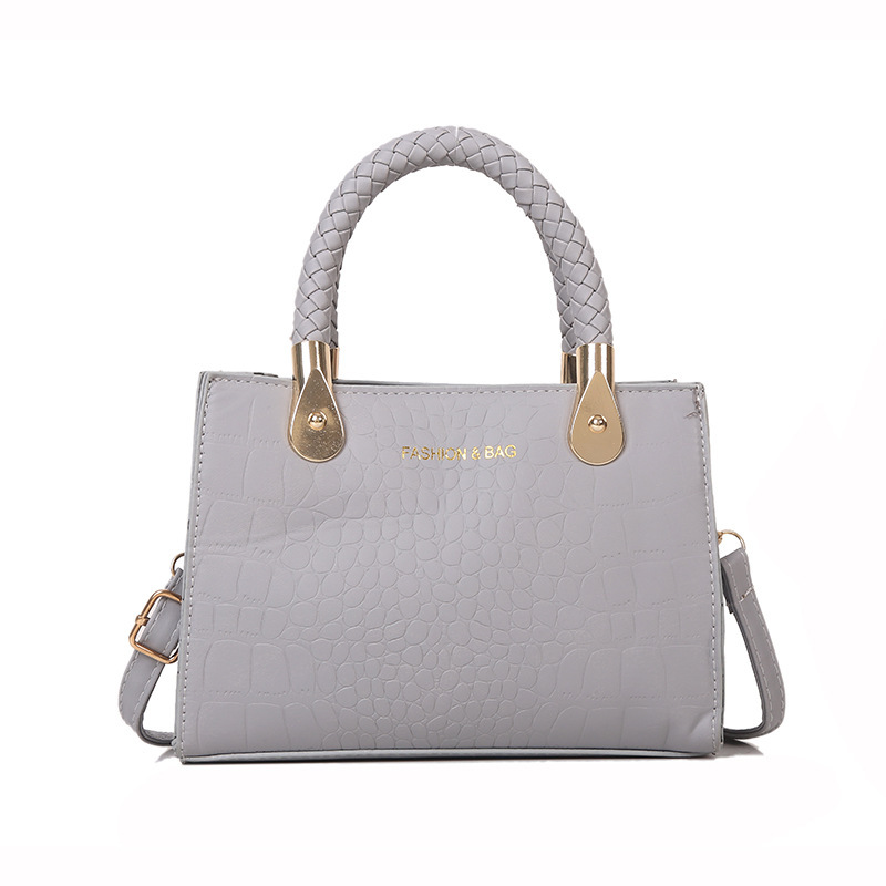 Bolsa de moda con textura para mujer 2024 estilo coreano estilo occidental nuevo color caramelo patrón de piedra bolso tejido bolsa de mensajero