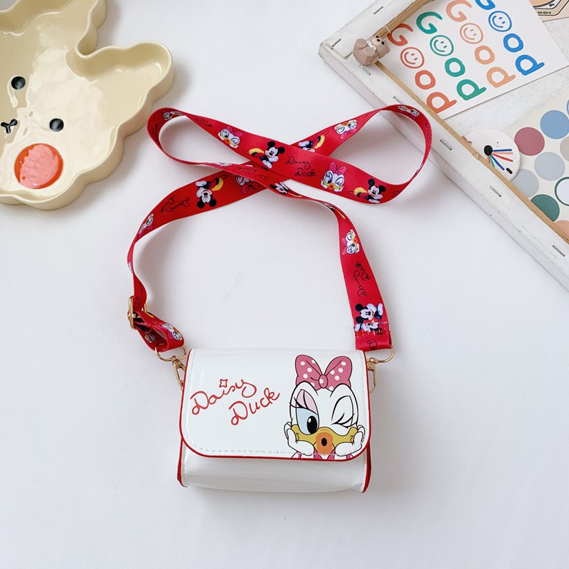 Los niños salen a la bolsa de cambio nuevo tipo mini bolso de moda fresco dulce caricatura para hombres y mujeres bolso de hombro