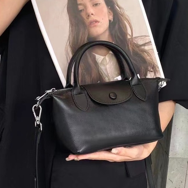 Bolsos femeninos 2024 nuevos bolsos femeninos de cuero de alta costura de moda 100 bolsos correccionales para viajeros de nicho bolsos portátiles