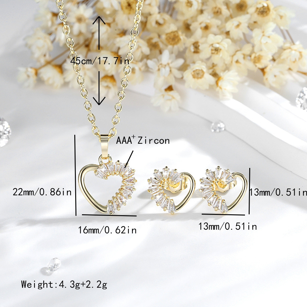 Ventas transfronterizas en caliente de Europa y los Estados Unidos colgante de corazón set de cobre 14K oro zircón collar joyería pendientes