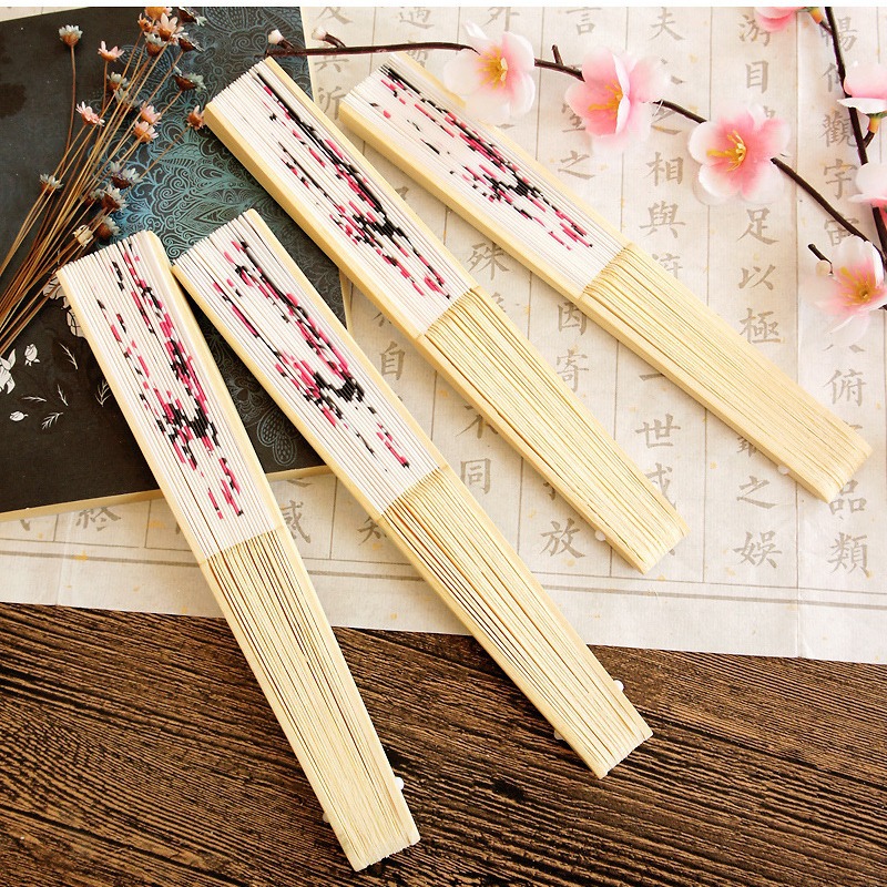 Hay en stock piezas de ventilador de pintura de tinta ligera transfronteriza ventilador de seda de ciruela