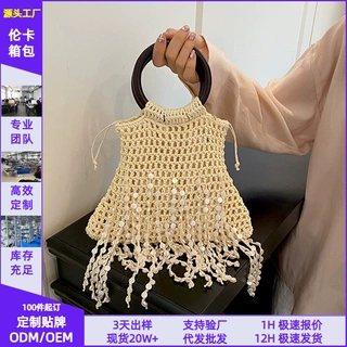 编织包女单肩斜挎水桶包法式文艺小众设计木环圆环流苏手提包包