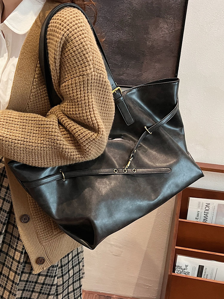 Bolsos de mujer Bolsos de alta capacidad portátiles de todo fósforo 2025 nuevo estilo retro moda casual bolso de hombro sentido bolso de mujer