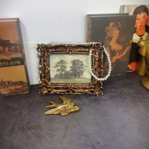 European American style retro nostalgic golden hollow photo frame French classical photo living room table creative ornaments hanging on the wall