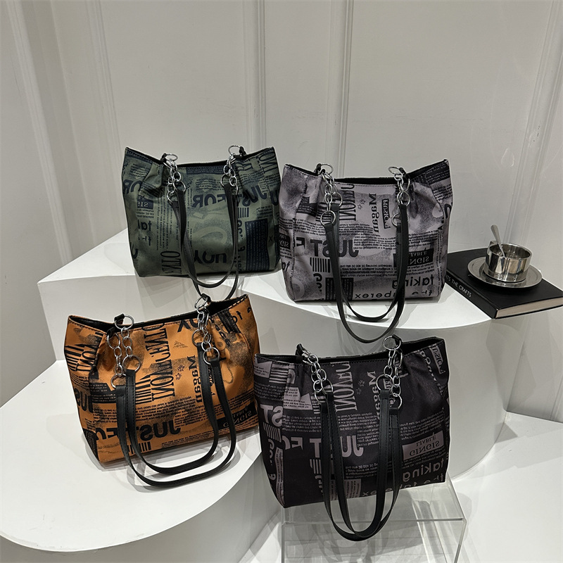 Bolsa de hombro de moda moda para mujeres 2025 nueva impresión de gran capacidad bolsa de mano simple de viaje bajo la axila