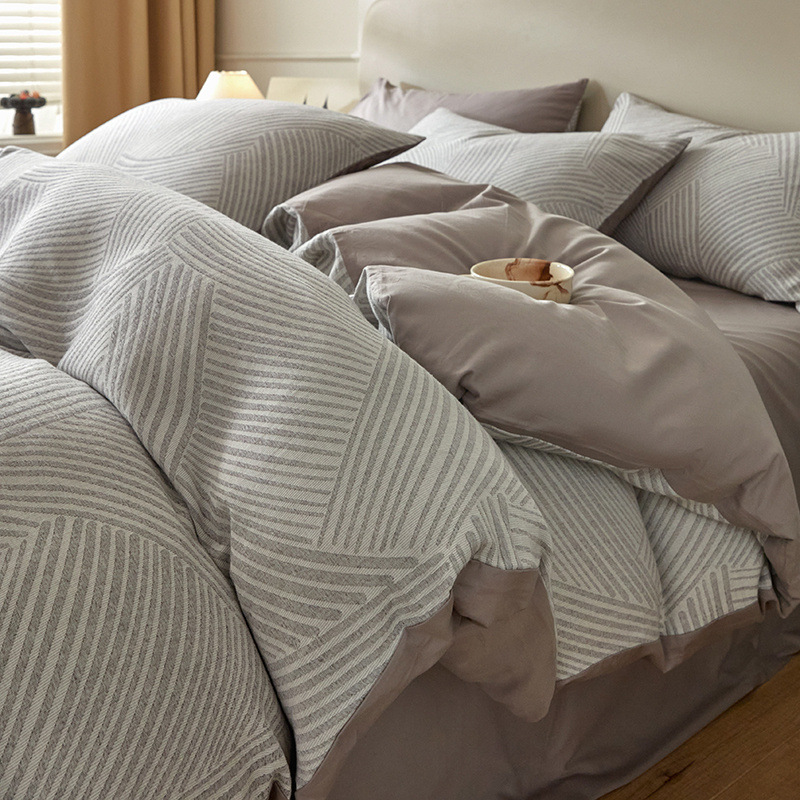 Una clase de madres y bebés Jacquard algodón puro cuatro piezas no impresa viento algodón desnudo cama