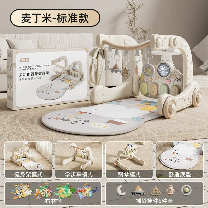 巧楽熊の赤ちゃんはピアノのフィットネスのフレームに足を踏み入れて歩いて3ヶ月6年の益智を学びます。