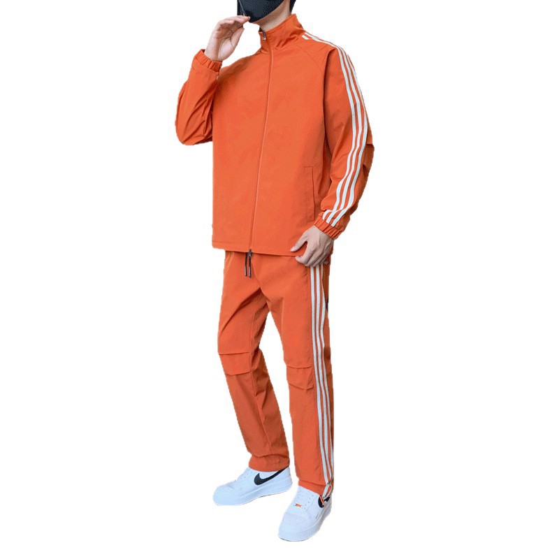 Primavera y otoño transfronterizos chaqueta delgada ropa deportiva hombre ocio tres barras juego de deporte de correr al aire libre dos piezas juego de comercio exterior