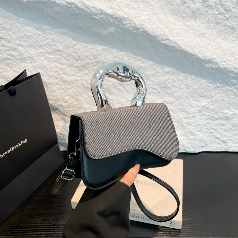 Bolso para mujeres 2025 primavera nuevo nicho de diseño de moda moda personalidad bolso de mano moda ocio mochila de hombro