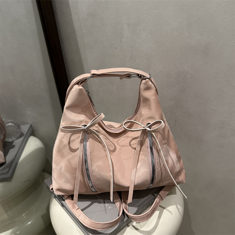 Bolsa de hombro retro suave pitot bolso arco 2025 nueva moda moda coreana bolsa de hombro de gran capacidad casual
