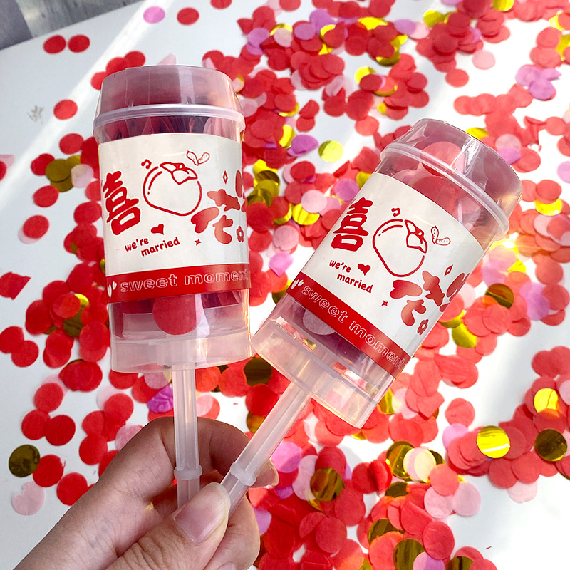 Boda tubo de pulverización boda pequeño regalo pistola mano empuje giro pistola cumpleaños pequeño regalo bomba empuje música