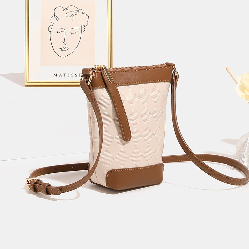 Primavera y verano mini bolso de balde de mujer 2026 nuevo estilo este año popular bolso de mochila versátil bolso de teléfono móvil bolso pequeño