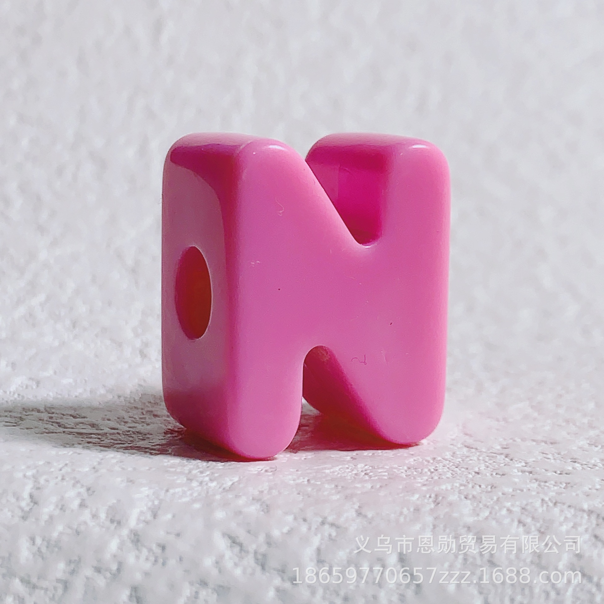 N (pink)