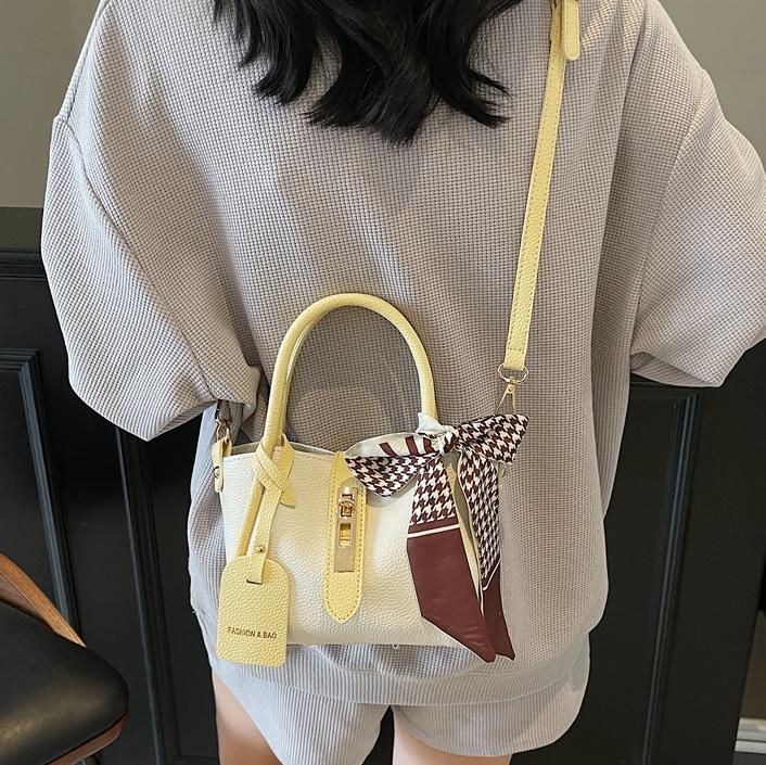 Comercio exterior explosivo bolso de cestas de verduras de mano mujer 2025 nuevo bolso de cinturón simple estilo coreano bolso de cubo de nicho