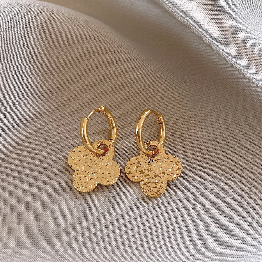 Aguja de plata MEDIADOS DE-antigua flor redonda borla pendientes de metal retro europeo y americano elegante luz pendientes de lujo al por mayor para las mujeres