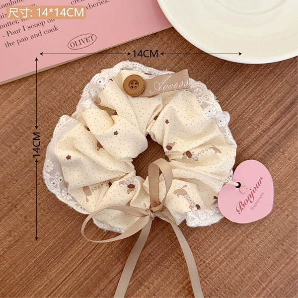 Yellow hairgrip with bow, lace dress