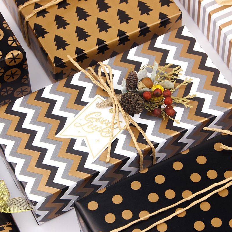 Amazon Oro Negro Navidad papel de regalo de cumpleaños del Día de San Valentín papel DIY hecho a mano bolsa cubierta de libro de papel al por mayor