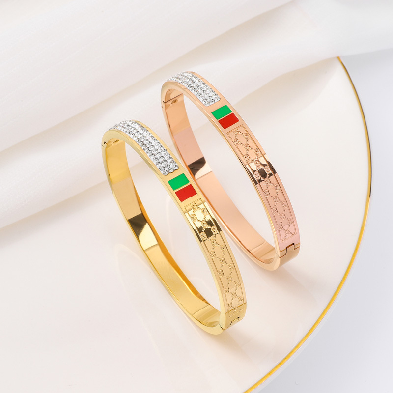 Transfronterizo nuevo rojo y verde goteo de aceite de acero de titanio elíptico 18K pulsera de oro femenina simulación universal pulsera coreana en stock al por mayor
