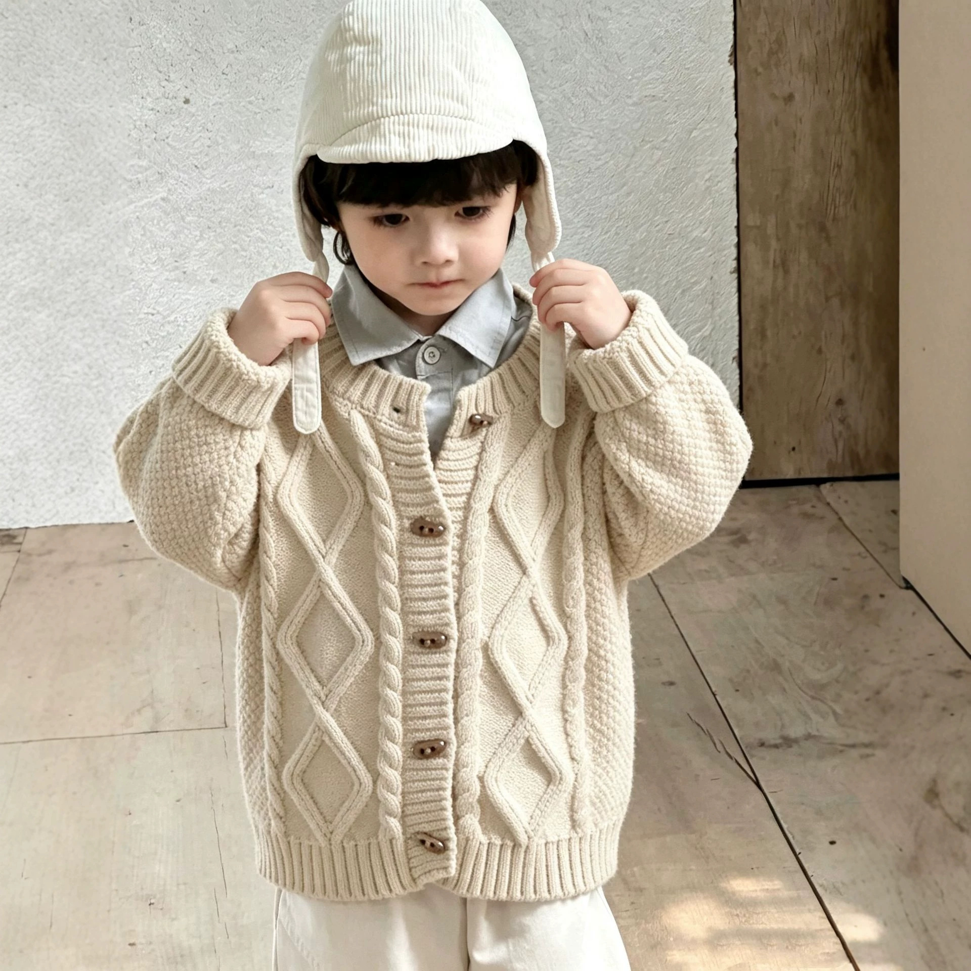 Source factory boys' diamond cable knit cardigan sweater, loose and casual outerwear, children's clothing, physical store wholesale.
