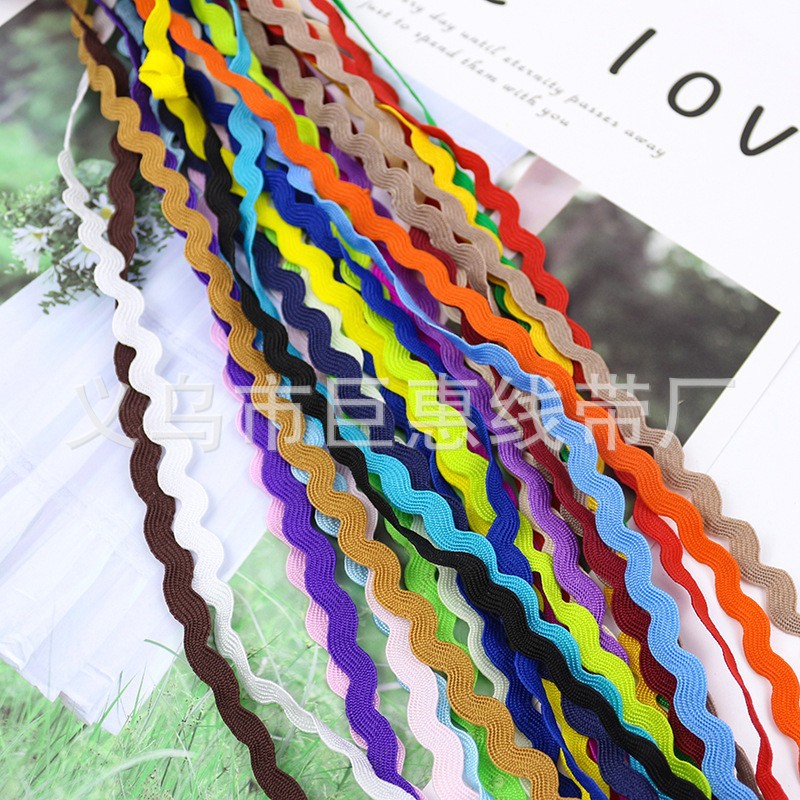 Fábrica al por mayor 5mm cinturón de onda de color en forma de S cinturón lateral curvo cinturón de marinero ropa textil para el hogar cinta de encaje decorativo