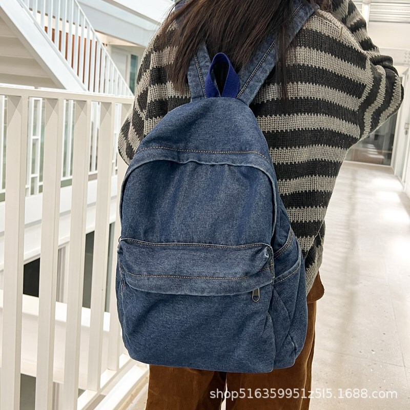 New Retro Washed Denim Backpack Korean Style Casual Versatile Large Capacity School Bag for Middle and High School Students with Computer Compartment New Retro Washed Denim Backpack Korean Style Casual Versatile Large Capacity School Bag for Middle and High School Students with Computer Compartment