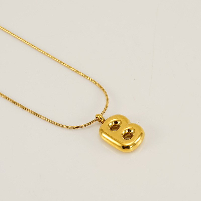 Burbujas transfronterizas 26 letras inglesas colgante brillante collar nicho universal oro acero titanio joyería collar