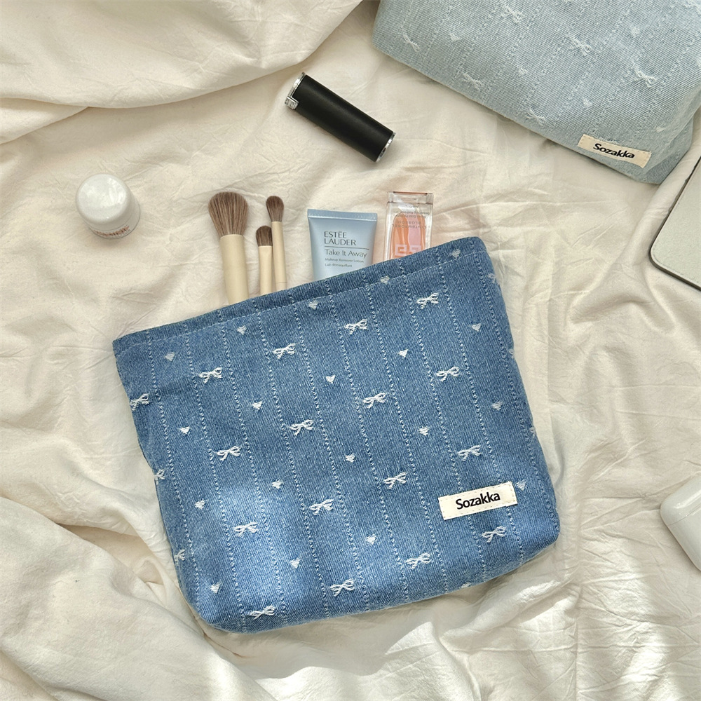 416g Weight Canvas Lining Material Zipper Closure Type / Strap Type Cosmetic Bag Bags Type Holiday, Travel, Daily Occasion Denim Material Bag, Cattle, Knot, Butterfly, Bow Knot Pattern All Seasons Season Women's Gender Cute Style Square Shape Cute Bag Cattle Knot Denim Square Makeup Bags 18