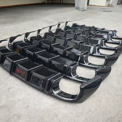 a large rear bumper lip, featuring a | Big Surrounded