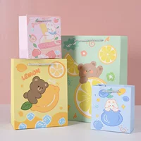 Подарочная сумка Утолщенная бумажная сумка Сумочка Подарочная сумка Студенческая школьная сумка Сумка для карандашей Два юаня Универмаг ювелирных изделий Товары