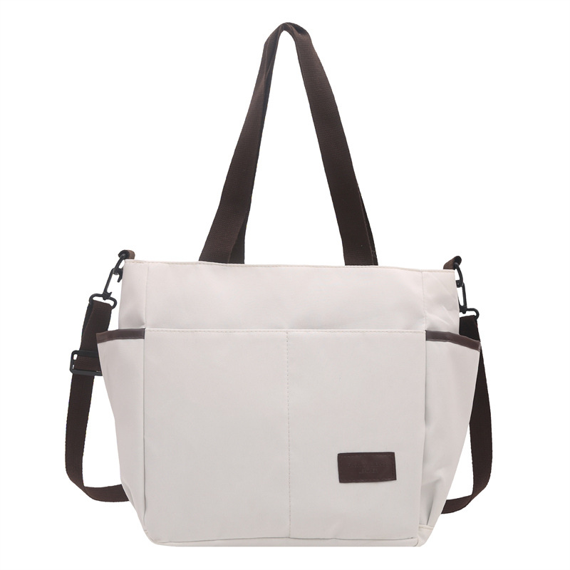Bolso de lona coreano para mujeres nueva moda ocio de gran capacidad mochila portátil tote simple bolso de hombro para estudiantes