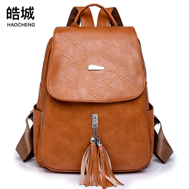 Spot wholesale 2023 nueva mochila casual de cuero suave para mujer Europa y América retro de gran capacidad con flecos mochila de viaje