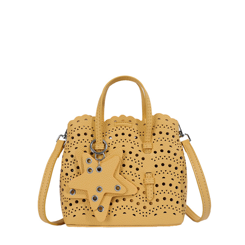 Bolsas de mano de tallado de onda transfronteriza, bolsas de cesta frescas de moda, bolsas de cubo de nicho de estilo extranjero diarias